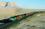 Burlington Northern, BN C30-7 5064 -BNSF C44-9w 1112 -SD40-2 7027 -8131 with a westbound on the ex-D&RGW at Desert Siding, Utah. April 18, 1997. 